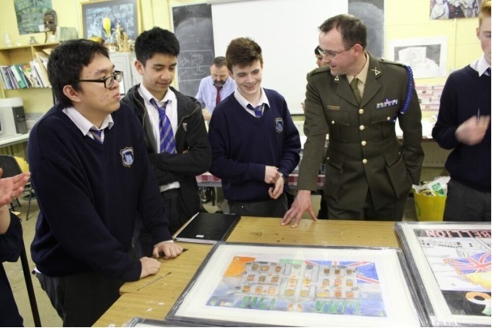 Commandant Padraic Kennedy with students of CBS, Drimnagh at the opening of exhibition “The Artists Rising”.